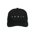 April Embroidered Logo Hat Black White Snapback